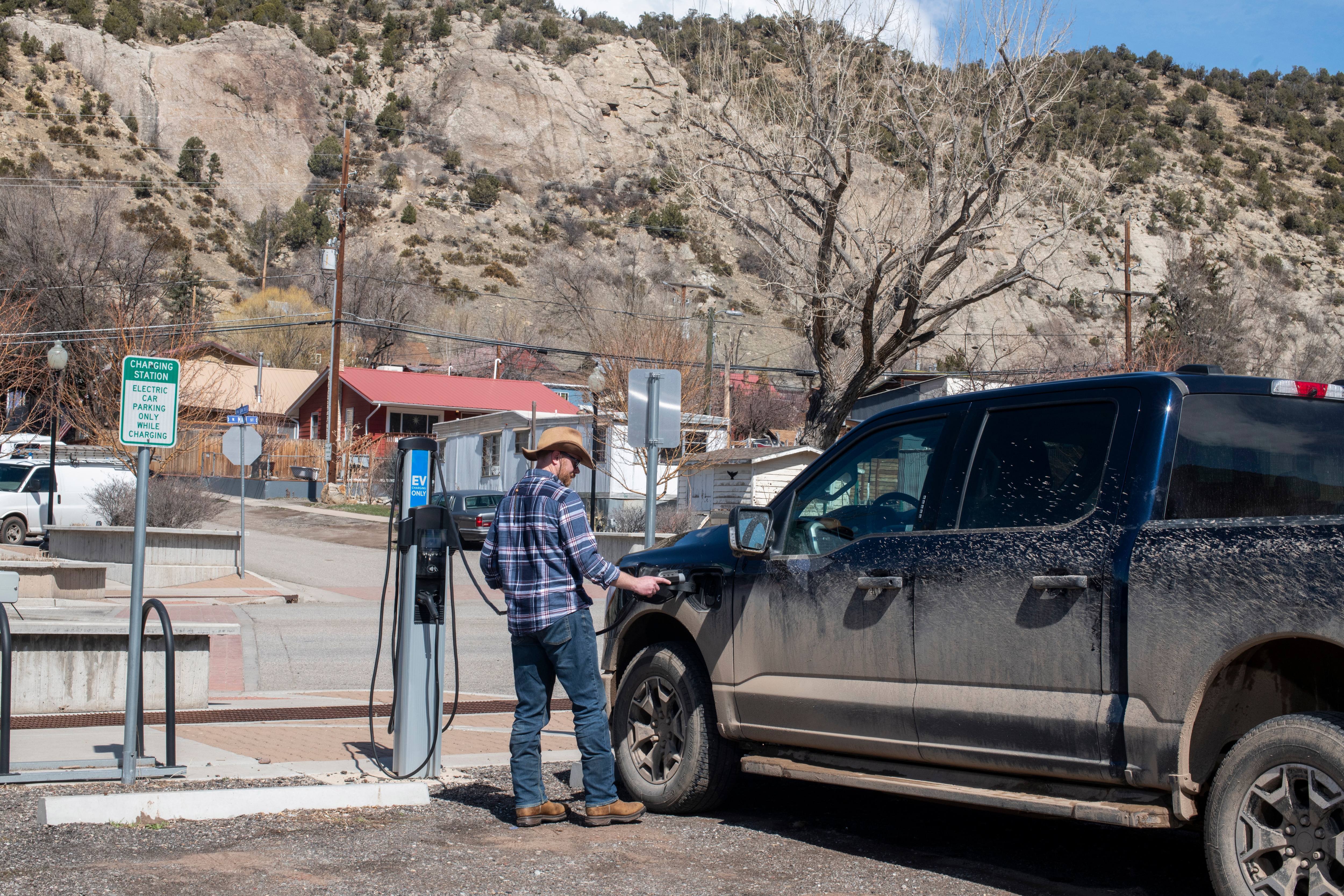 Ben Westby charges his Ford F-150 Lightning on Sunday, March 17, 2024 in New Castle, Colorado. Rachel Woolf for Ford